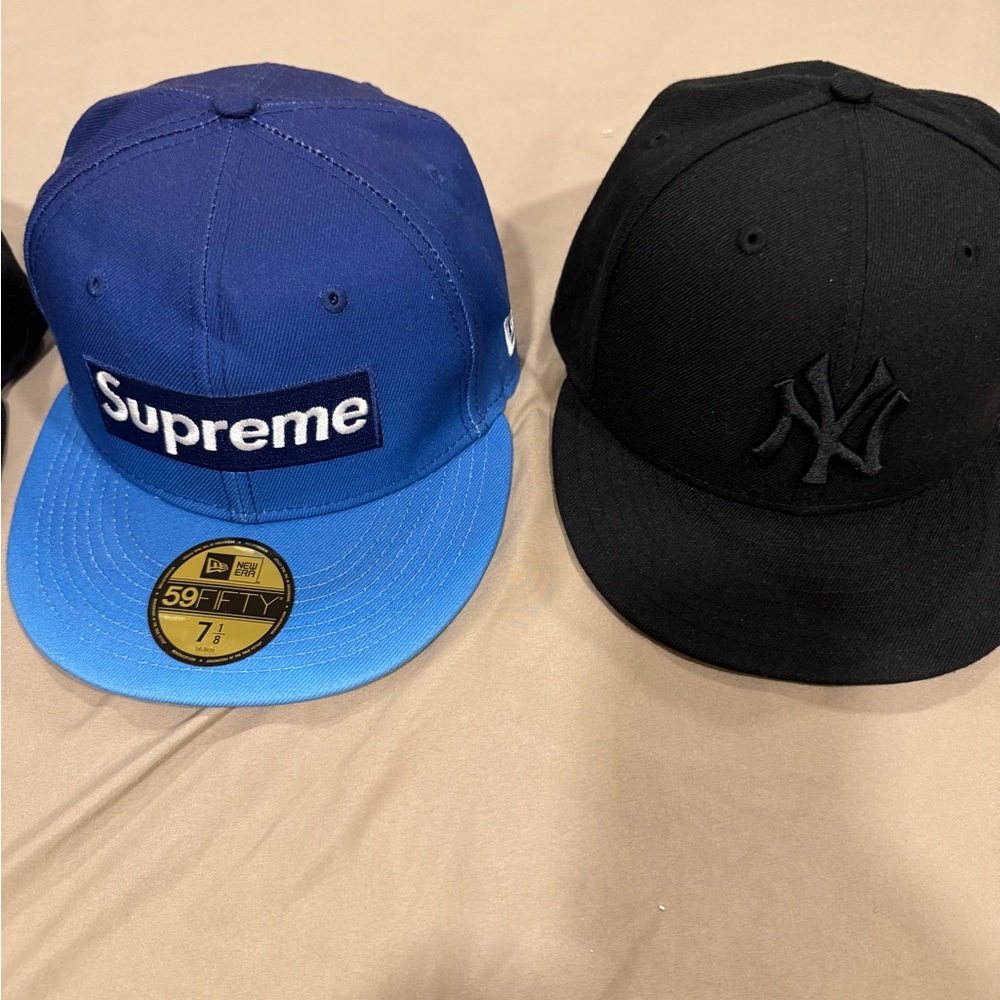 New Era Blue and Black Caps by supreme and New York Yankees in size 7 1/4